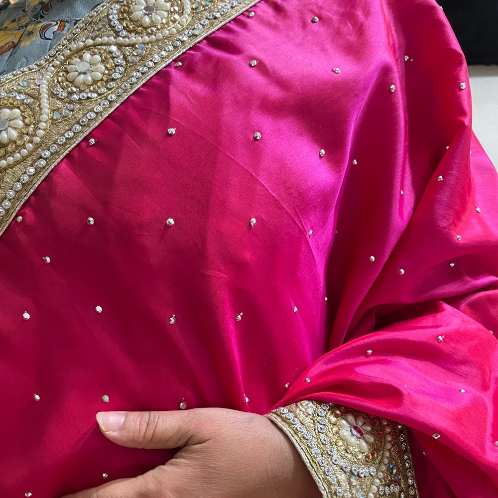 Pink and beige silk and net saree